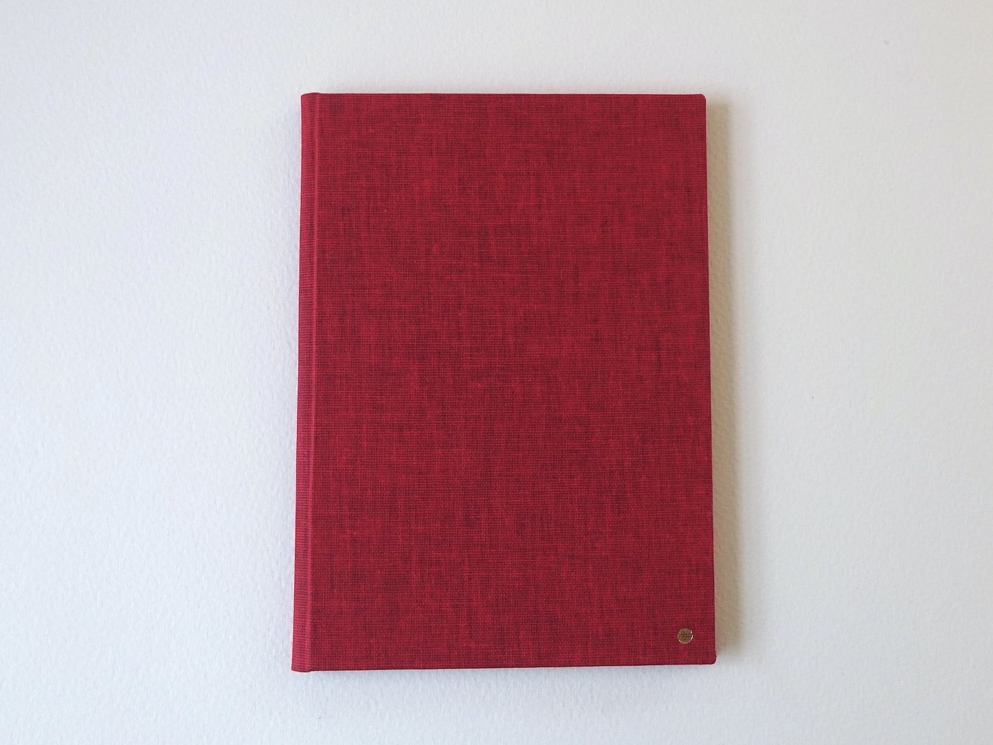red slim bright notebook cover