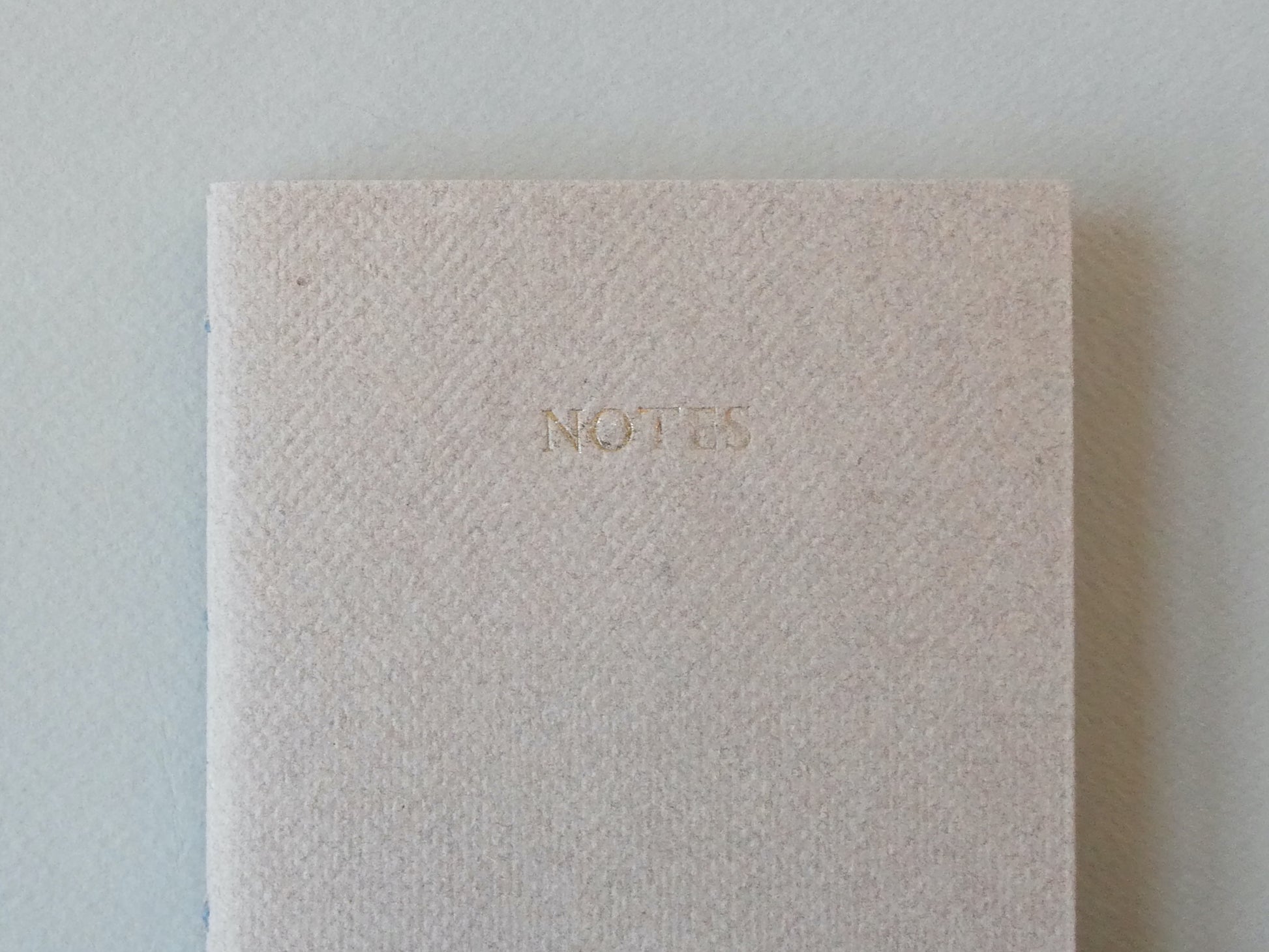 Celandine Books light brown notebook with gold lettering