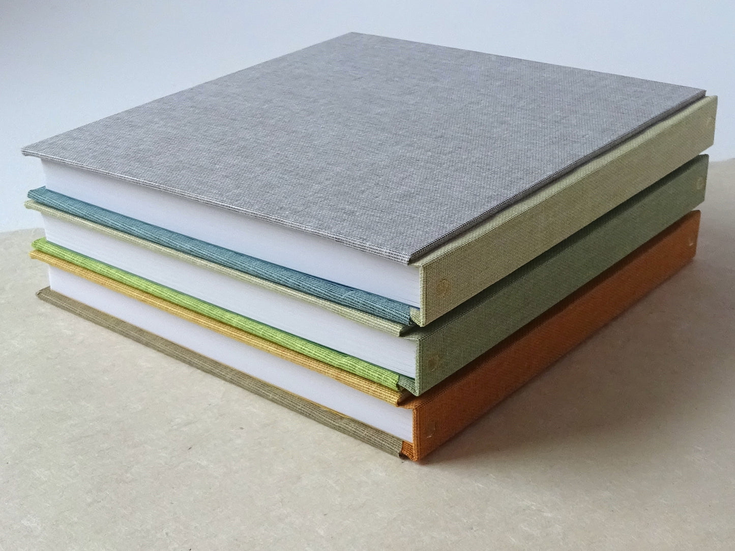 3 three colours square sketchbooks spine detail