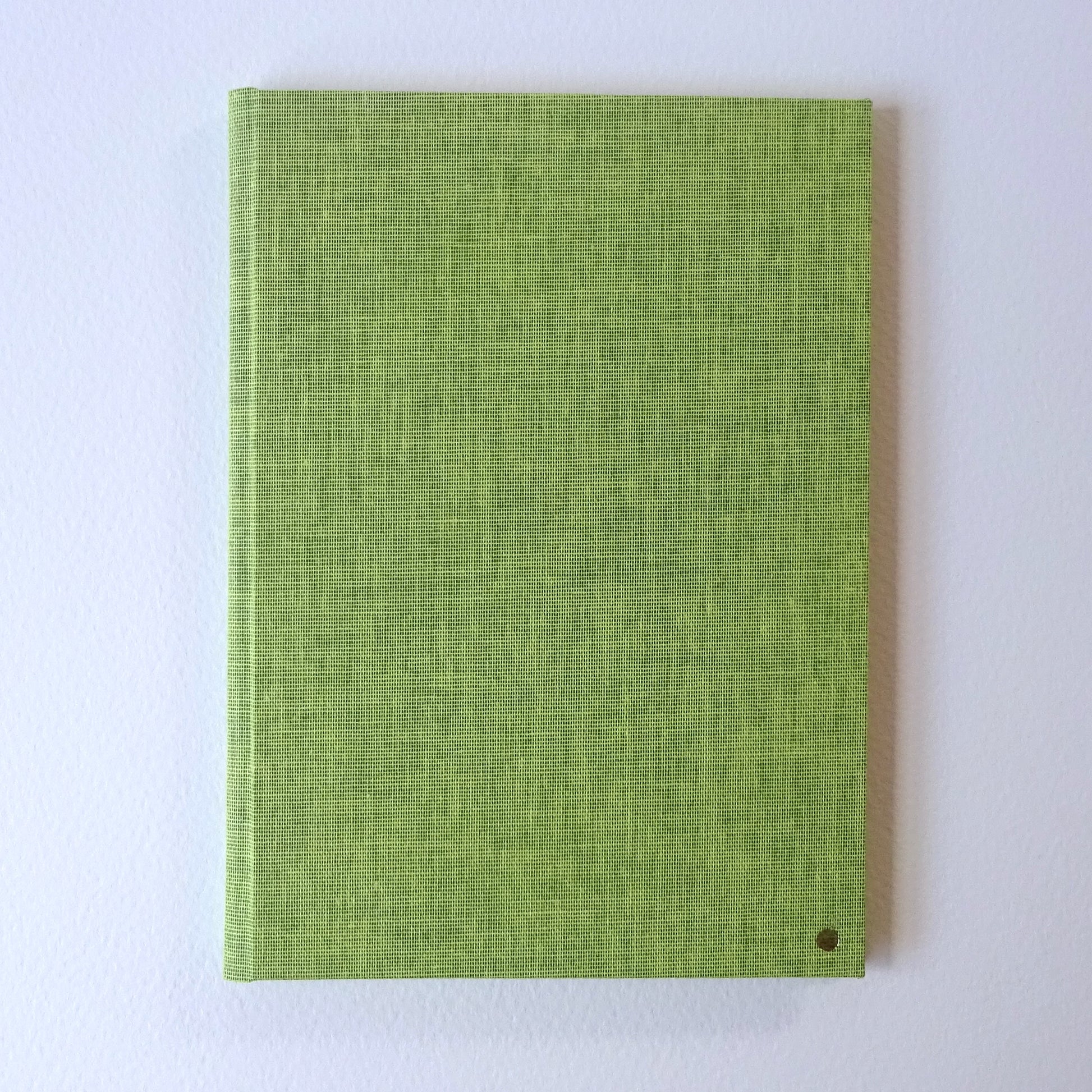 green slim bright notebook front