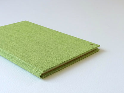 green slim bright notebook