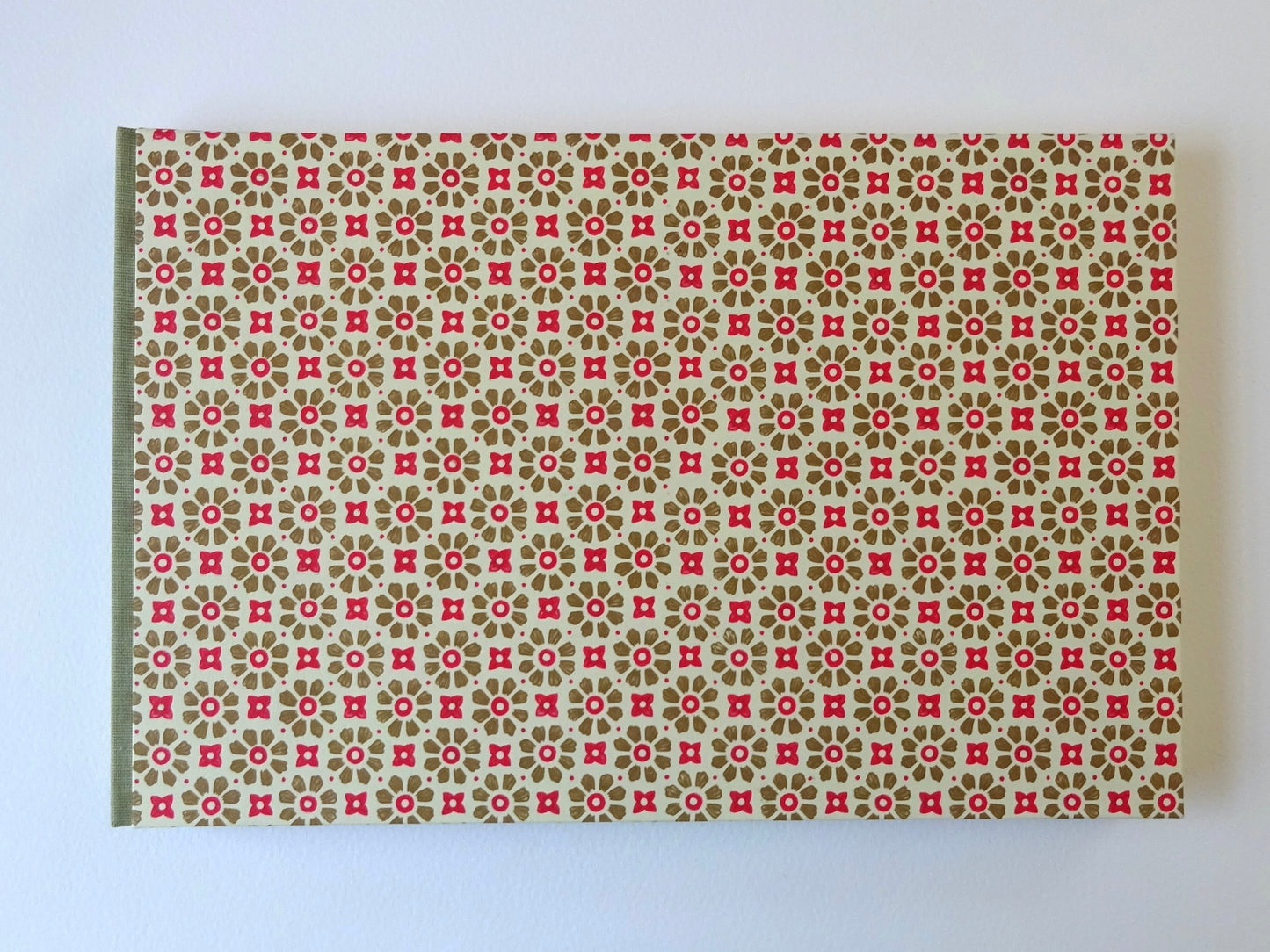 large hand bound watercolour sketchbook with green and red Italian pattern paper