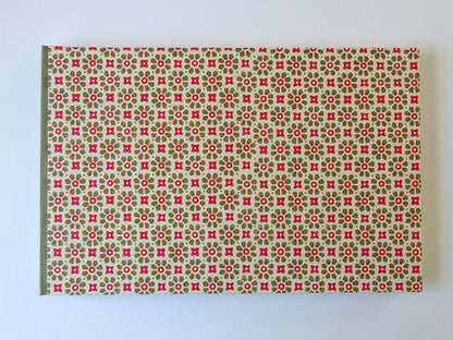 large hand bound watercolour sketchbook with green and red Italian pattern paper