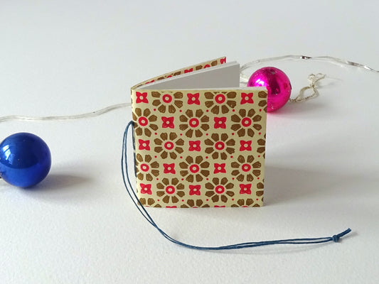Tiny Book for the Xhristmas Tree with baubles