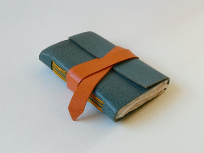 Celandine Books teal blue leather mini book spine