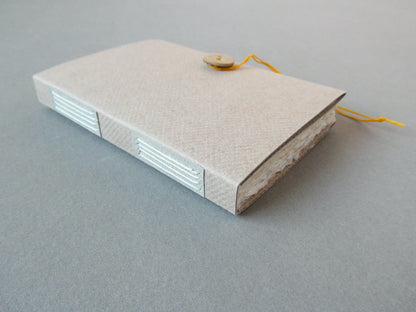 Handmade Paper Notebook with Vellum Plackets and Coconut Button
