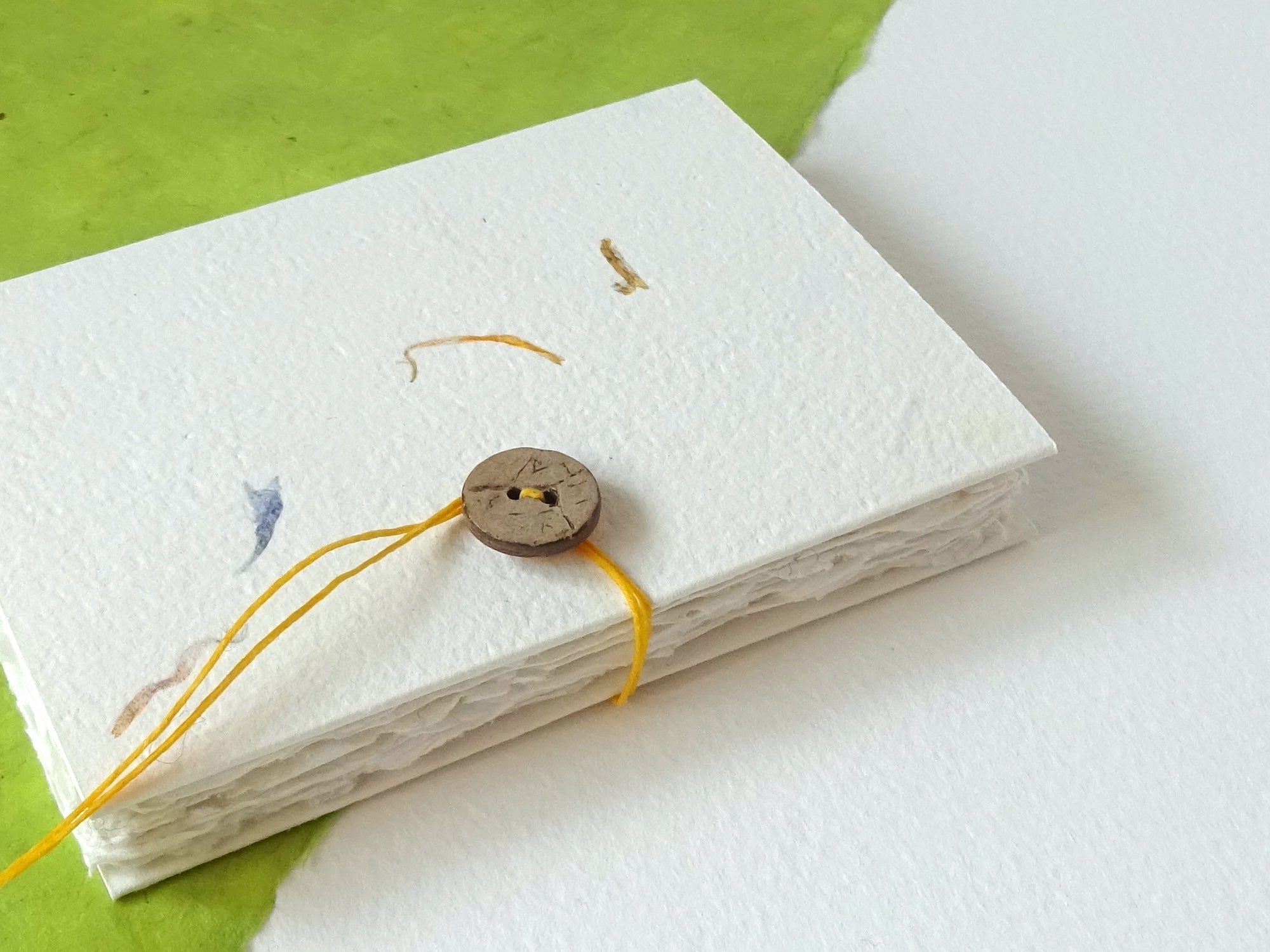 Handmade paper notebook with petal paper