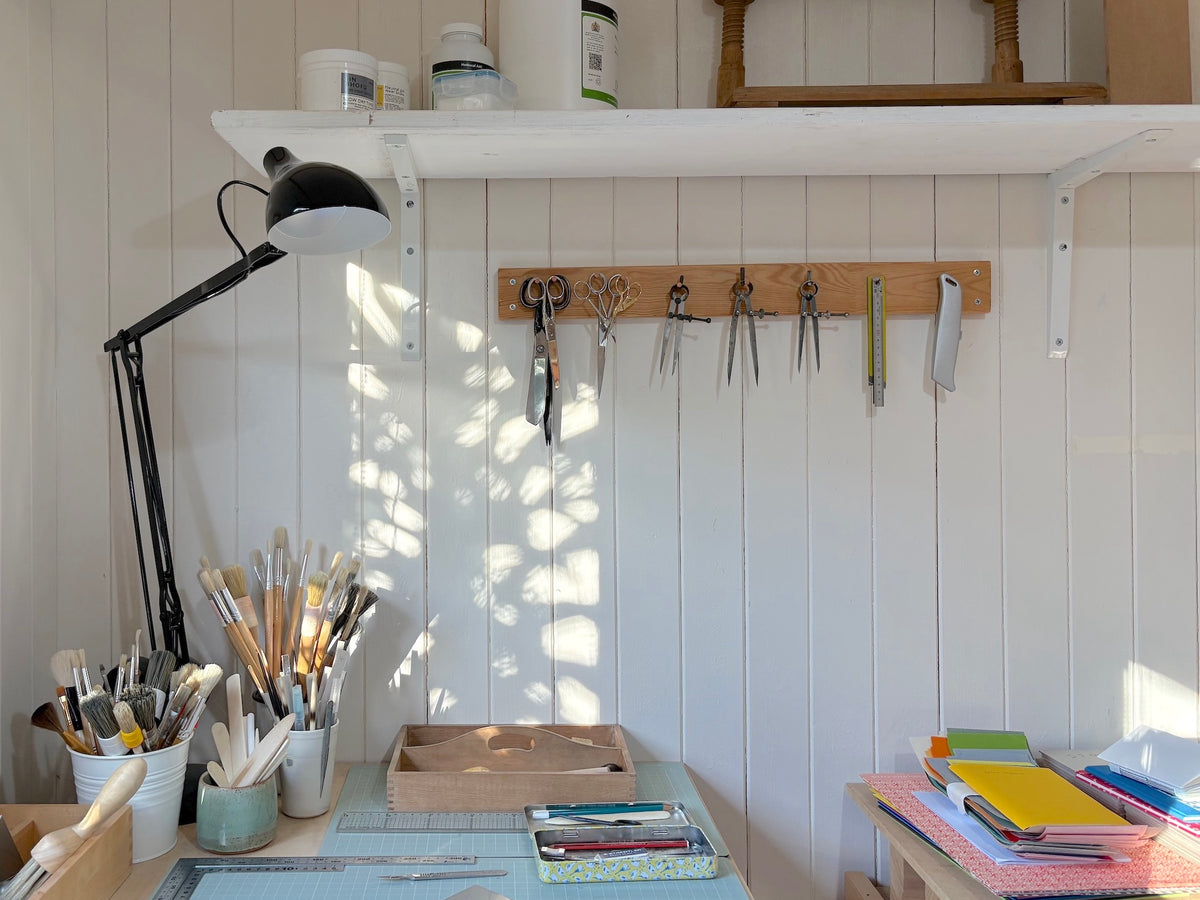 A sunny corner of Celandine Books bookbinding studio