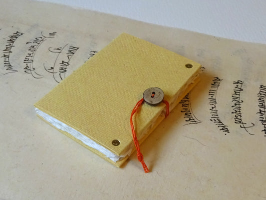 ochre handmade paper mini book