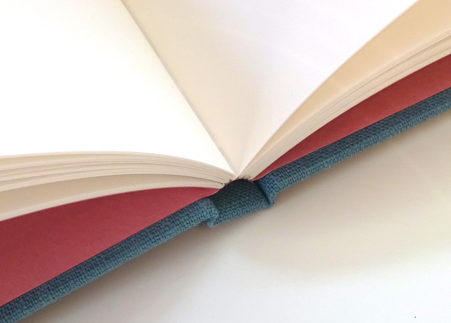 blue linen sketchbook open pages detail
